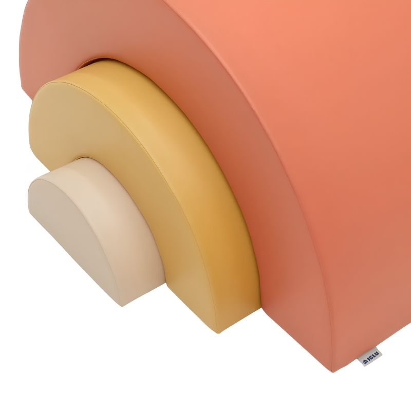 Close-up of the IGLU Rainbow Montessori Soft Play Set foam arch bridge showing the stitched IGLU brand tag