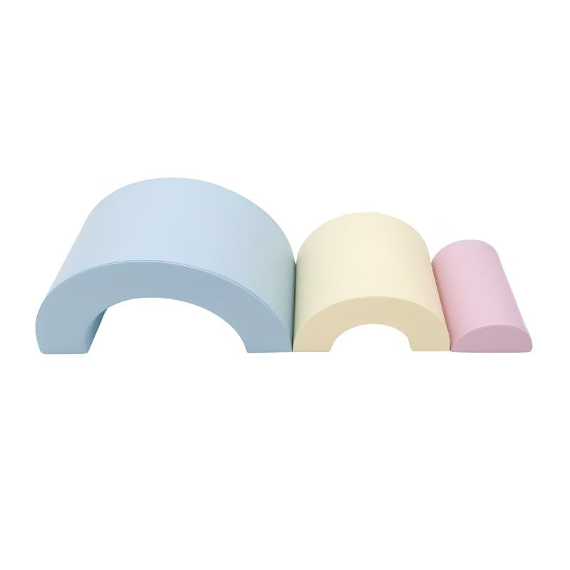 Three foam bridge pieces of the IGLU Rainbow Montessori Soft Play Set arranged in a row
