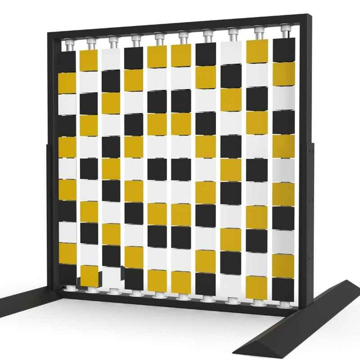 Angled view of the LiteZilla Mosaico Wall freestanding rotating wall panel with black, white and yellow triangles in a lattice pattern