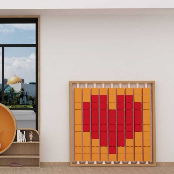 LiteZilla Mosaico Wall rotating wall panel in orange and red tiles forming a heart pattern for an interior sensory space