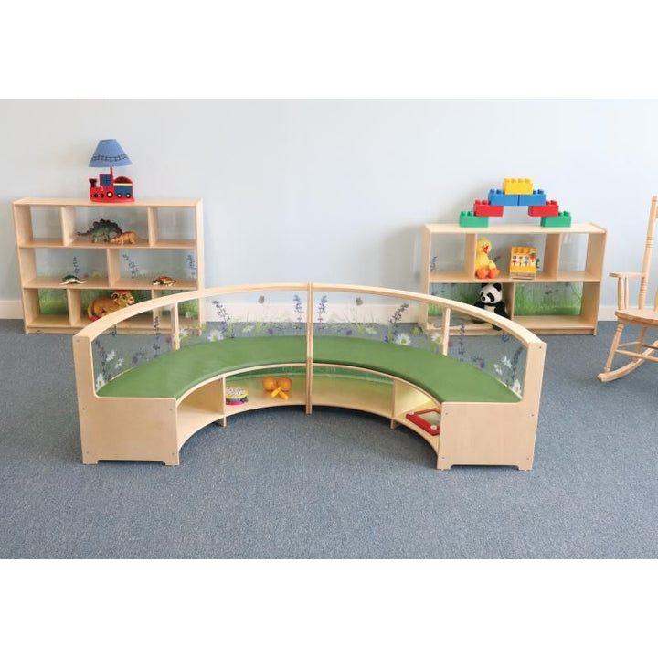 Two Whitney Brothers Nature View Curved Sofas in the curve-in style joined into a semicircle for group reading and story time