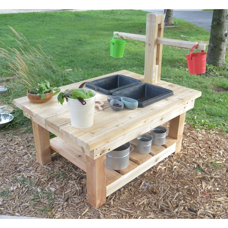 Close-up view of the ONP Large Explorer Table wooden balance scale and galvanized sink, the integrated outdoor STEM discovery tools that support weighing, measuring, and sensory investigation for preschool and early years groups