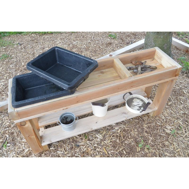Top-down view of the ONP infant outdoor sensory table showing all three removable cedar bins ready to be filled with water, mud, or natural materials