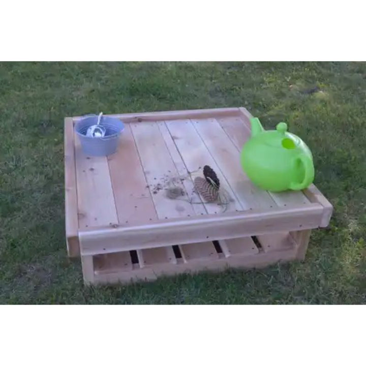 ONP Infant Square Table 12" High portrait view showing the Western Red Cedar outdoor construction at infant height, an all-weather cedar outdoor activity table for floor-accessible infant and early years outdoor learning across Canada and the US