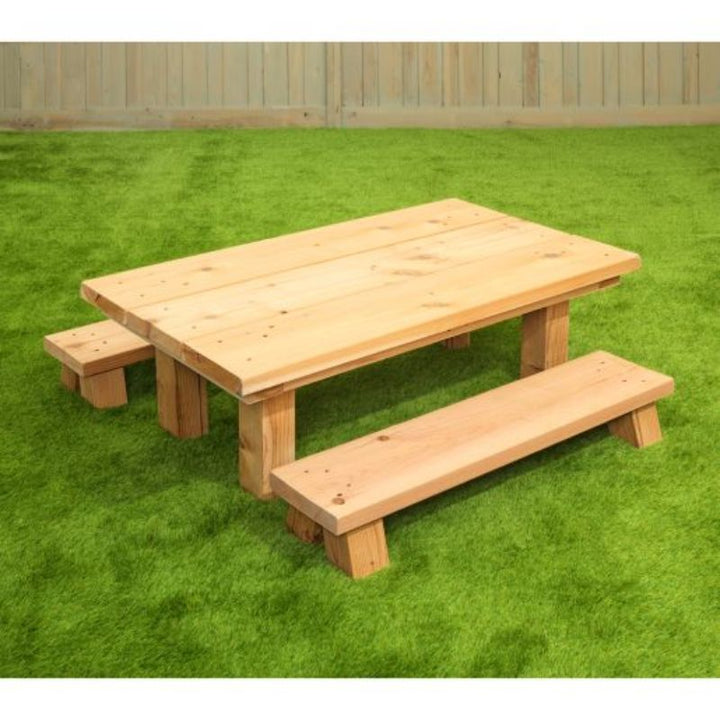 ONP Infant Table and Benches clear view showing the complete Natural Western Red Cedar outdoor set with 14-inch table height and 5-inch bench height, designed for independent infant and toddler use in outdoor classrooms and childcare settings across Canada and the US