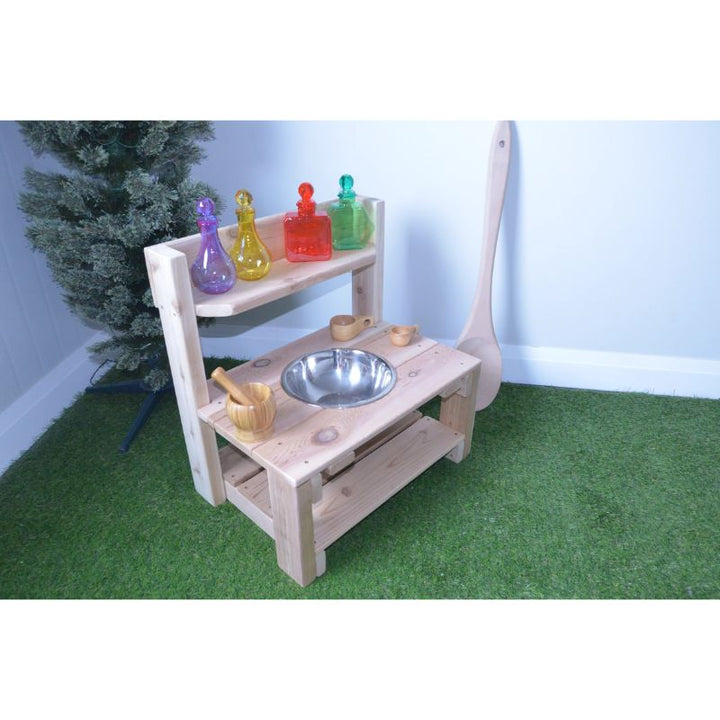 Top-down view of the ONP Mini Mud Kitchen showing the aluminium bowl set into the Western Red Cedar work surface, a compact outdoor messy play and sensory kitchen for toddlers and preschoolers