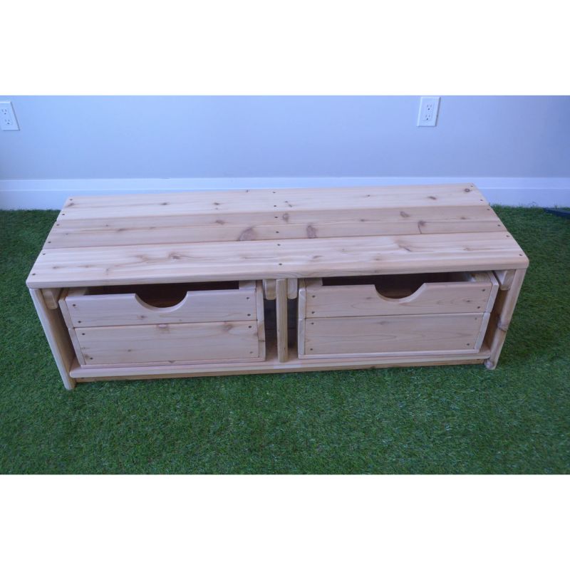 Detail view of the ONP Outdoor Bench with Storage showing the built-in storage space beneath the cedar seat, designed for outdoor point-of-use materials storage in preschool and early years outdoor classrooms