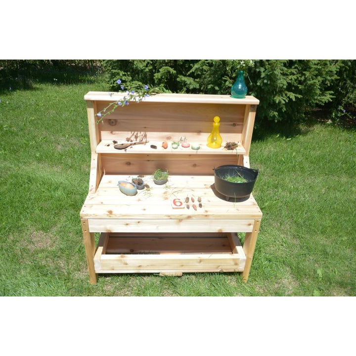 ONP Outdoor Creative Concoction Table in portrait view, showing the full North American Cedar construction of this outdoor messy play and role play station for early years settings