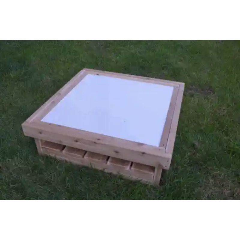 ONP Outdoor Square Art Table infant version in portrait view, showing the white dry-erase surface and North American Redwood Cedar frame for outdoor early years creative play