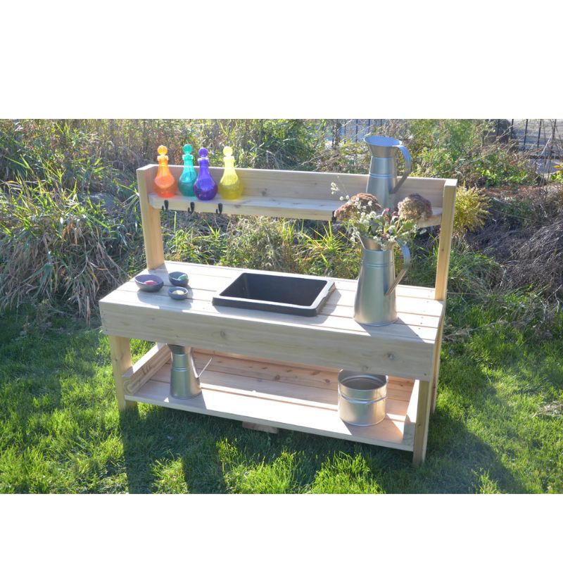 ONP Pre-School Mud Kitchen in North American Red Cedar showing the full-length countertop and integrated rubber sink, designed for outdoor sensory play in preschools and daycares