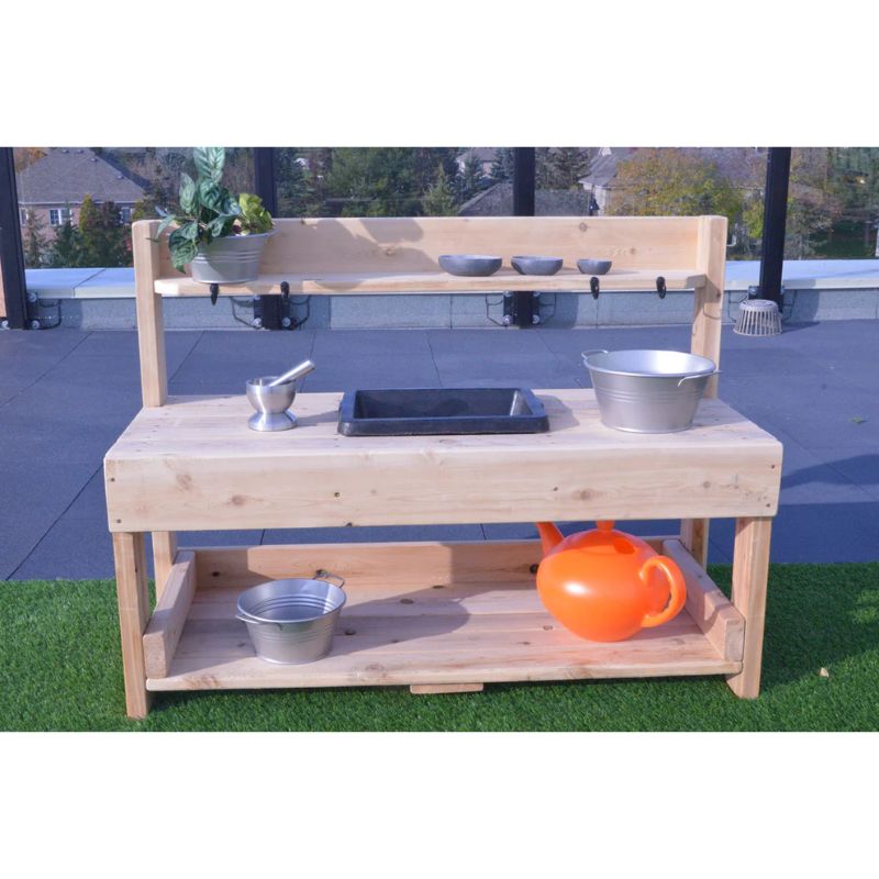 ONP Pre-School Mud Kitchen portrait view with accessories showing the cedar construction and rubber sink, ideal for preschool outdoor classroom and daycare outdoor play