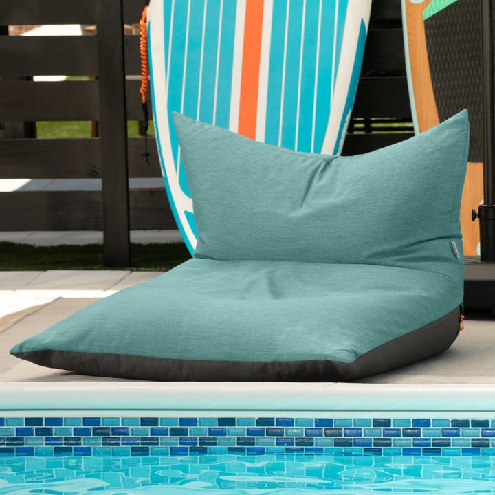 Jaxx Finster outdoor bean bag chair in Breeze Sunbrella fabric, poolside