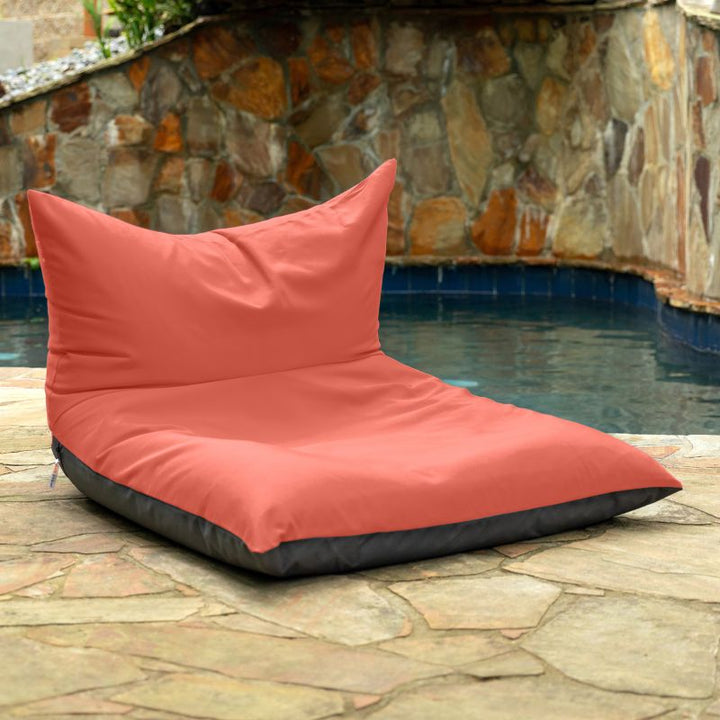 Jaxx Finster outdoor bean bag chair in Flamingo Sunbrella fabric, poolside