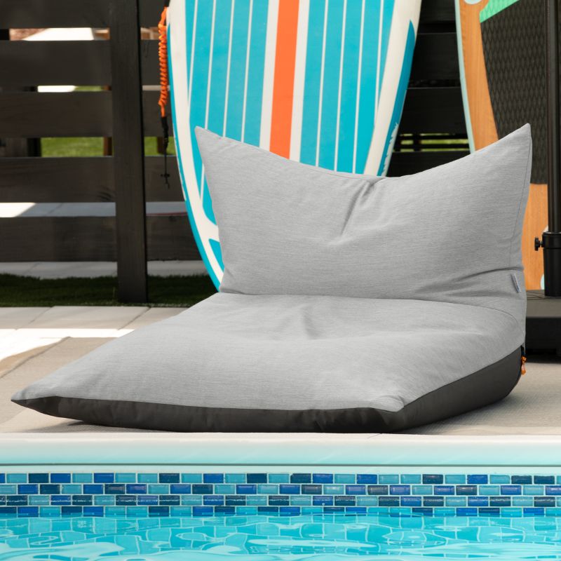 Jaxx Finster outdoor bean bag chair in Granite Sunbrella fabric, poolside