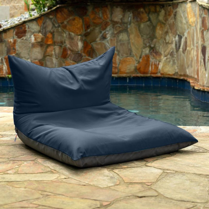 Jaxx Finster outdoor bean bag chair in Navy Sunbrella fabric, poolside