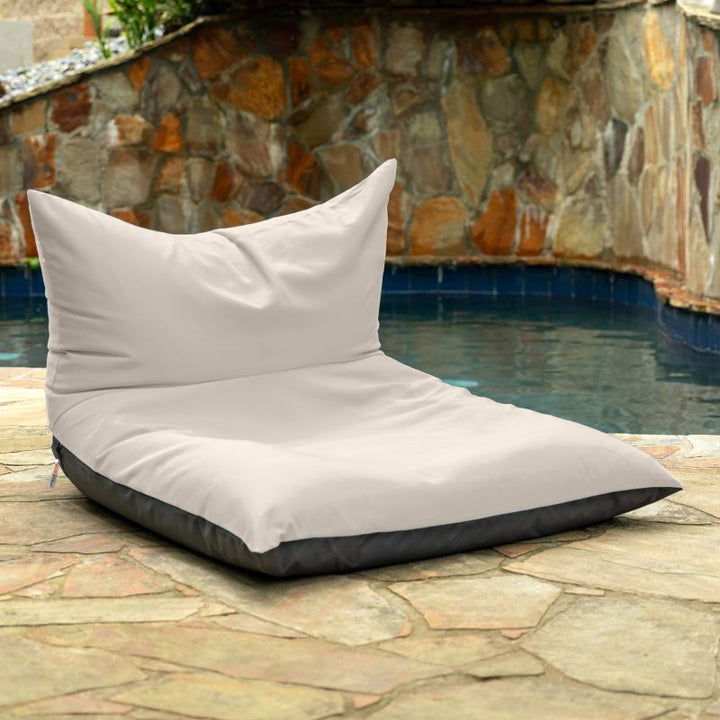 Jaxx Finster outdoor bean bag chair in Pearl Sunbrella fabric, poolside