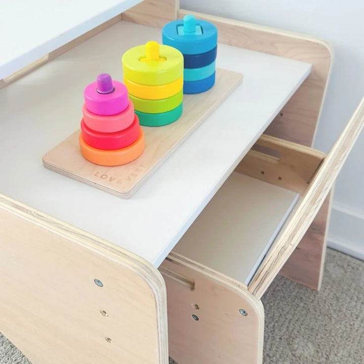 Top view of the Sapiens Child Papaya Double Adjustable Montessori Table showing the 22.2 inch wide work surface, table borders, and tray rail of the Vancouver-made two-child Montessori table set