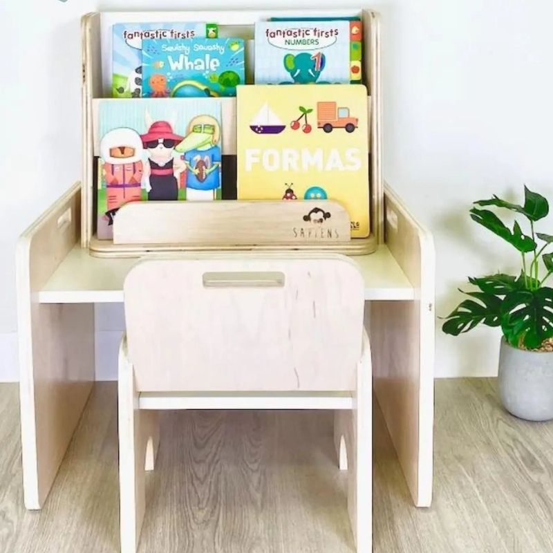 Boy child engaged in active play at the Sapiens Child Papaya Set Montessori table from a side view, showing the adjustable chair and table height positioning for independent child-height work