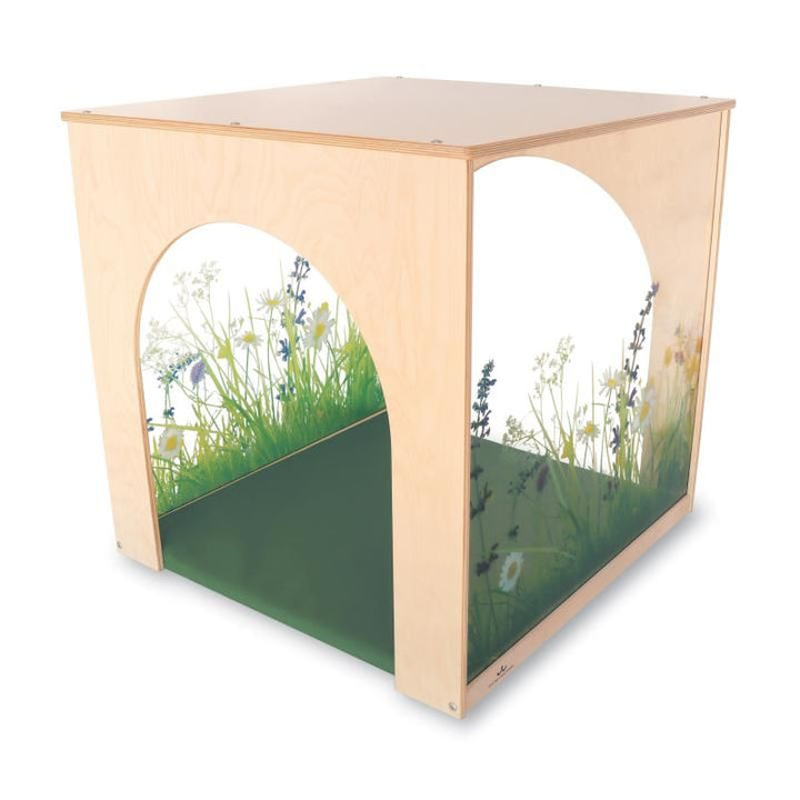 Whitney Brothers Nature View Playhouse Cube with Mat in birch plywood, with wildflower acrylic side walls creating a bright quiet space for kids