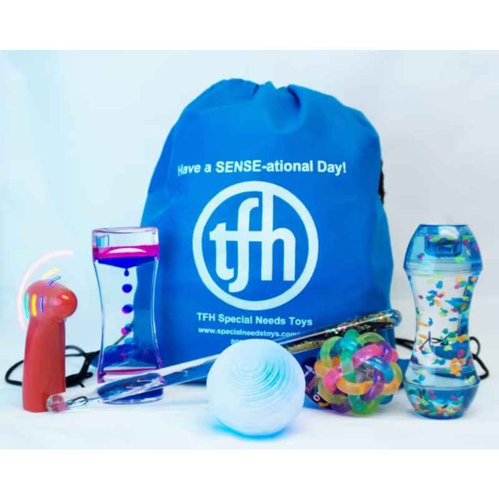 TFH Visual Sensory Backpack included with the Portable Sensory Den Kit, showing liquid motion toys and sensory manipulatives for on the go play