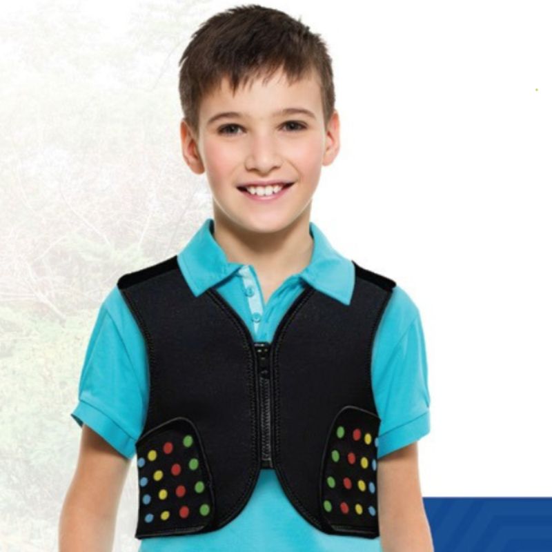 Boy wearing the Power WearHouse ProPower Compression Vest from the front, showing the front zipper and neoprene construction for deep pressure therapy