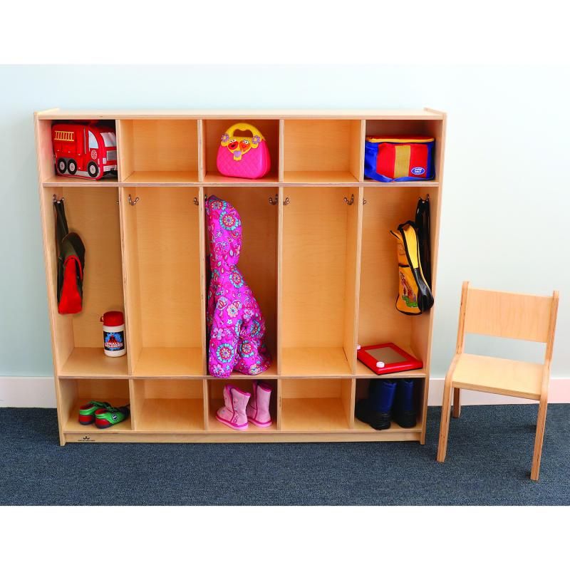 Whitney Brothers Five Section Coat Locker in a preschool classroom, a birch plywood preschool coat locker with jackets, boots and lunch bags stored for 10 children
