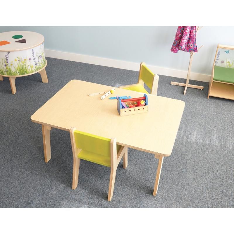 Overhead view of the 20 inch Whitney Plus Rectangle Table from Whitney Brothers, a preschool rectangle table with a toy toolbox and two classroom chairs
