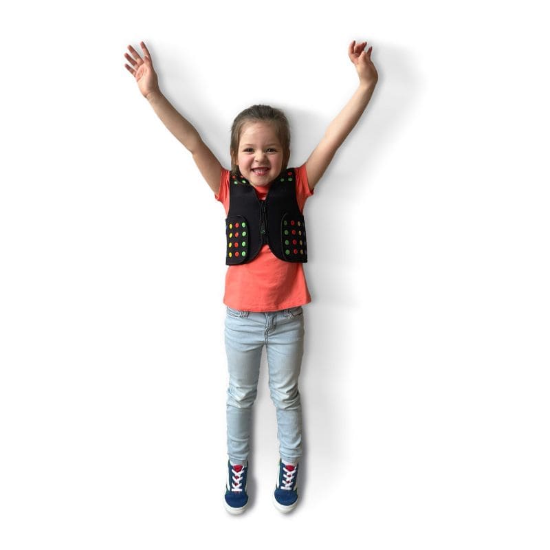 Child modelling the Power WearHouse ProPower Compression Vest against a white background, showing the deep pressure vest fit and neoprene design for kids