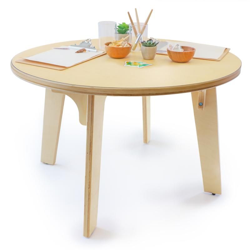 Wooden bowls of shells and crystals with clipboards on the Whitney Brothers Whitney Plus Round Table, a 22 inch round activity table for sensory exploration