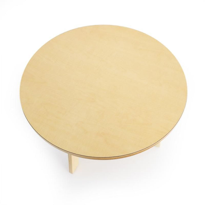 Top view of the 35 inch maple laminate surface on the Whitney Brothers Whitney Plus Round Table, an 18 inch round classroom table built for rigorous daily use