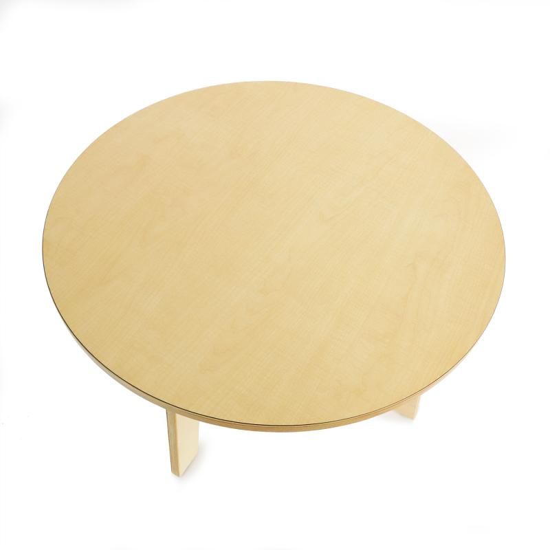 Overhead view of the scratch-resistant maple top on the Whitney Brothers Whitney Plus Round Table, a 20 inch round classroom table for schools and daycares