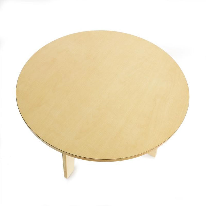 Overhead view of the scratch-resistant maple top on the Whitney Brothers Whitney Plus Round Table, a 20 inch round classroom table for schools and daycares