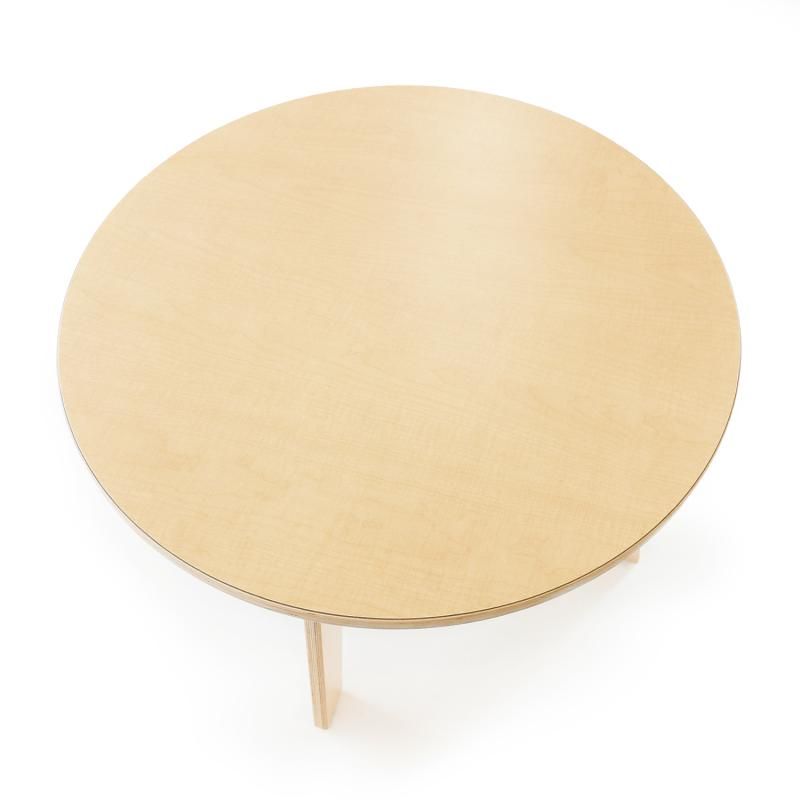 Top-down view of the 35 inch maple laminate surface on the Whitney Brothers Whitney Plus Round Table, a 22 inch round classroom table