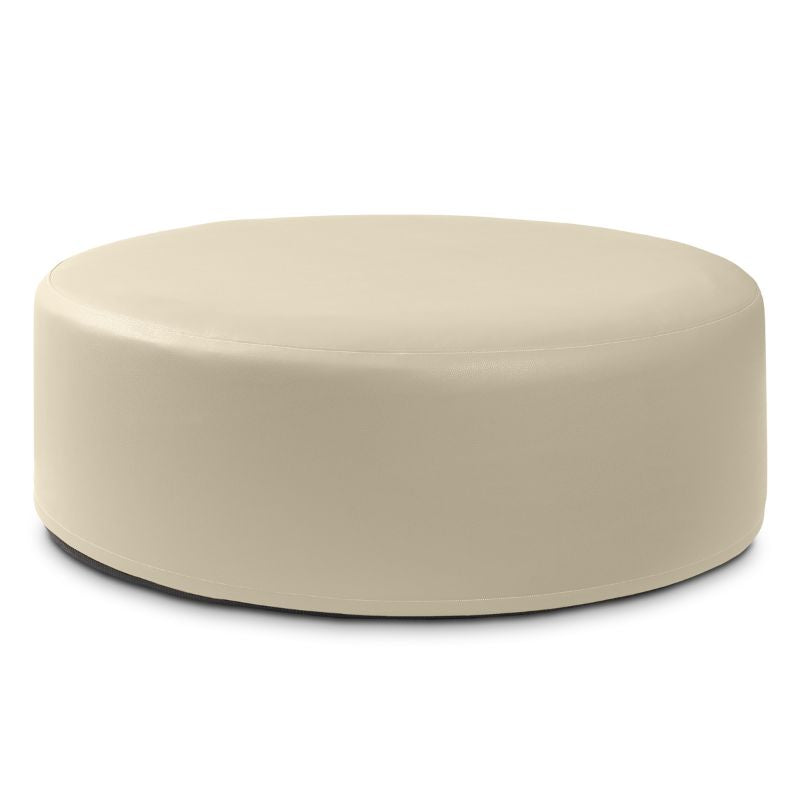 Jaxx Candler round ottoman in cream beige, flexible foam seating for classrooms and libraries