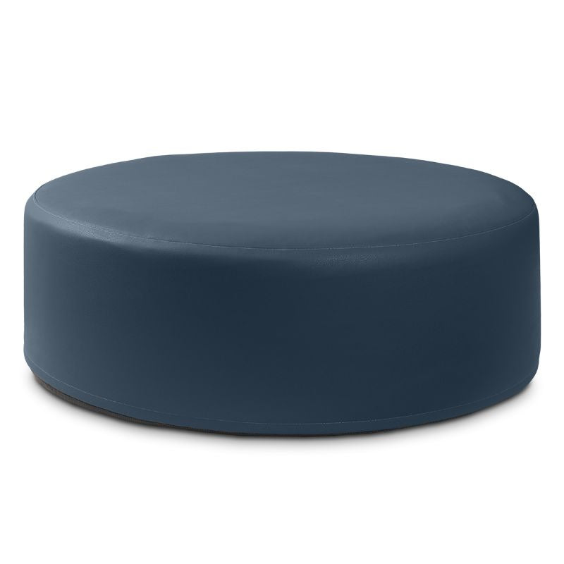 Jaxx Candler round ottoman in dark navy, flexible foam seating for classrooms and libraries