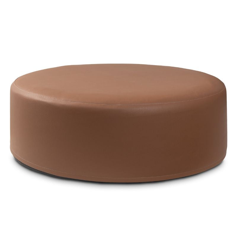Jaxx Candler round ottoman in a warm medium brown, flexible foam seating for classrooms and libraries