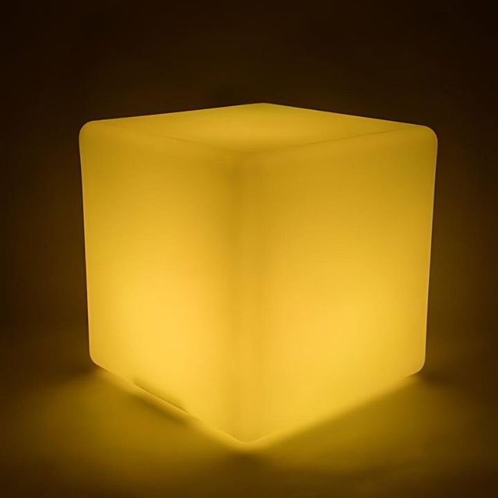 ROYLCO LED Colour Changing Light Cube in yellow light mode, showing the bright LED illumination across five play surfaces of this rechargeable sensory cube for STEAM and sensory exploration