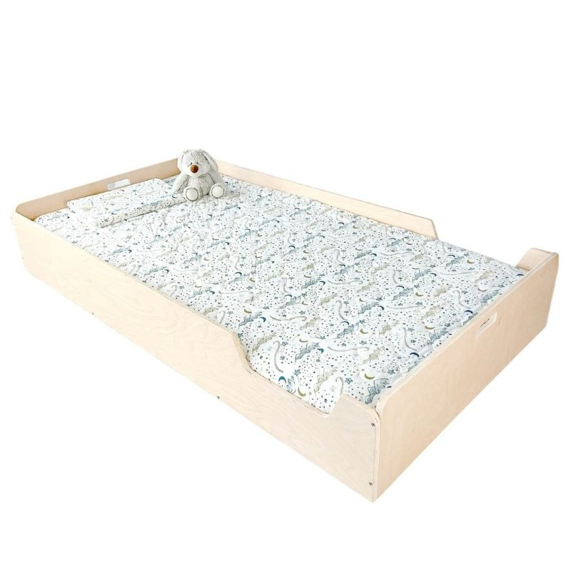 Sapiens Child Apple Montessori floor bed with rails in Natural Maple plywood finish, showing the smooth hand-varnished surface and rounded safety edges made in Vancouver