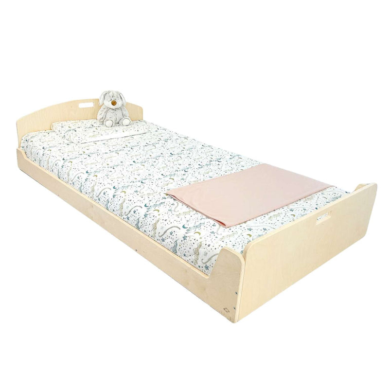 Sapiens Child Cherry Montessori floor bed shelf-free variant in Maple plywood, landscape view showing the clean open low-profile twin frame made in Vancouver