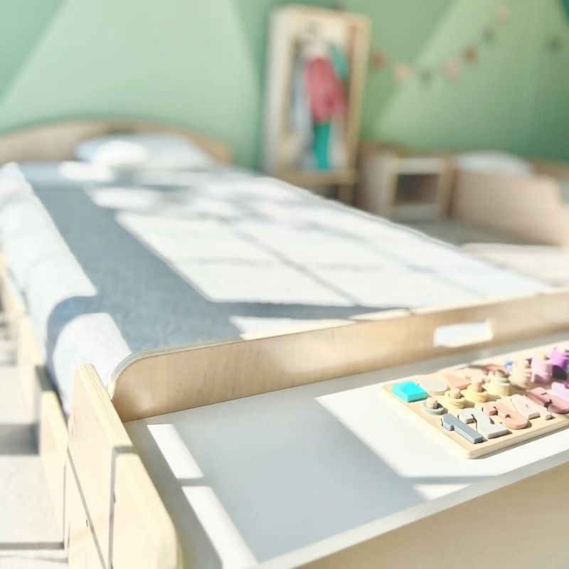 Fourth landscape view of the Sapiens Child Cherry Twin Montessori floor bed showing the Birch plywood variant in a clean presentation