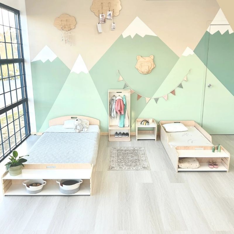 Sapiens Child Cherry Twin Montessori floor bed styled in a children's bedroom, showing the low-profile Canadian-made design in a real home setting
