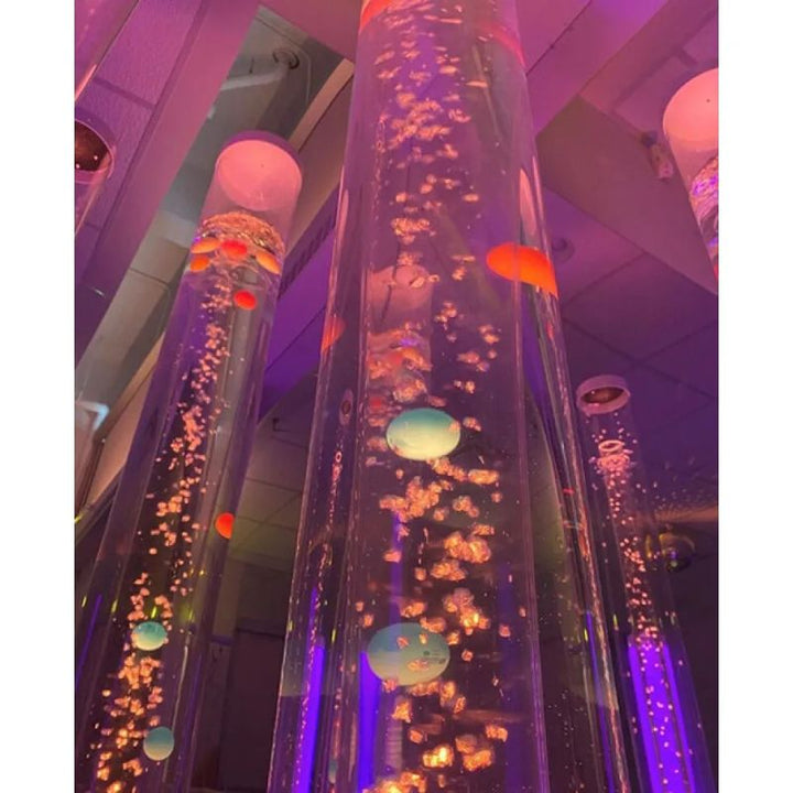 Close-up of TFH Interactive LED Bubble Tubes with rising bubbles and floating coloured balls, a calming LED bubble tube for visual sensory stimulation