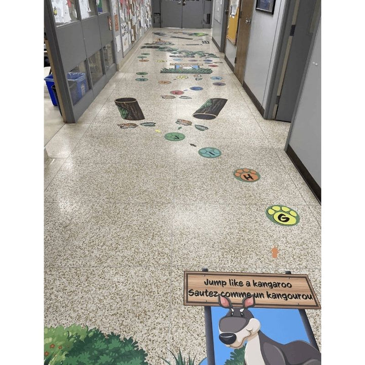 Sensory Paths Jungle Safari Full Path installed in a school hallway showing the complete jungle-themed animal movement sensory corridor with 3M vinyl anti-skid floor decals, Made in Canada