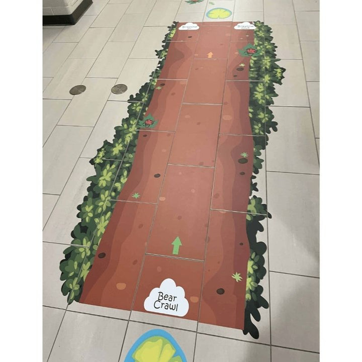 Second view of the Sensory Paths Nature Walk Full Path installed in a school hallway showing the nature-themed 3M vinyl sensory movement path with frog and ladybug characters