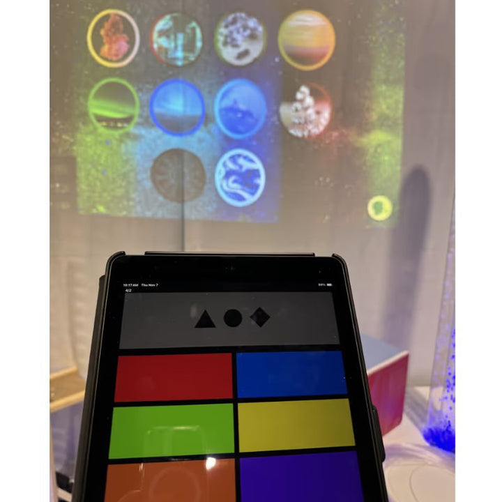 TFH ChromaTheme theme selector menu on the MSE Genie app with the ten colour coded video themes displayed on a sensory room wall