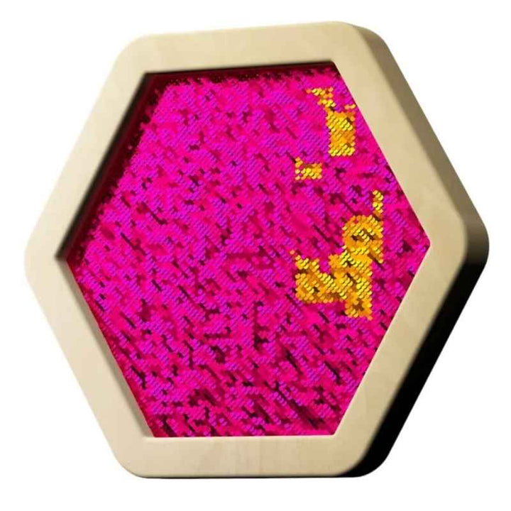 LiteZilla Sequin Flip Hexagon Panel in pink, an angled view of the gold and pink reversible sequin wall panel