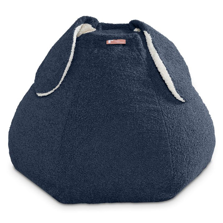 Raven-Symoné HopSeat sherpa bean bag chair in navy blue, a tactile sensory bean bag chair for family lounging