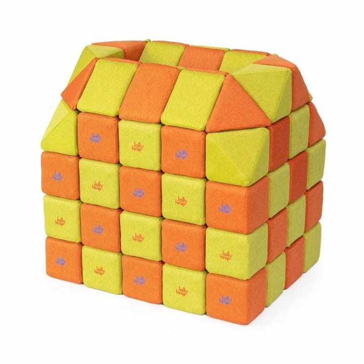 A small structure built with JollyHeap Creative Set soft magnetic blocks in an orange and lime green colour combination