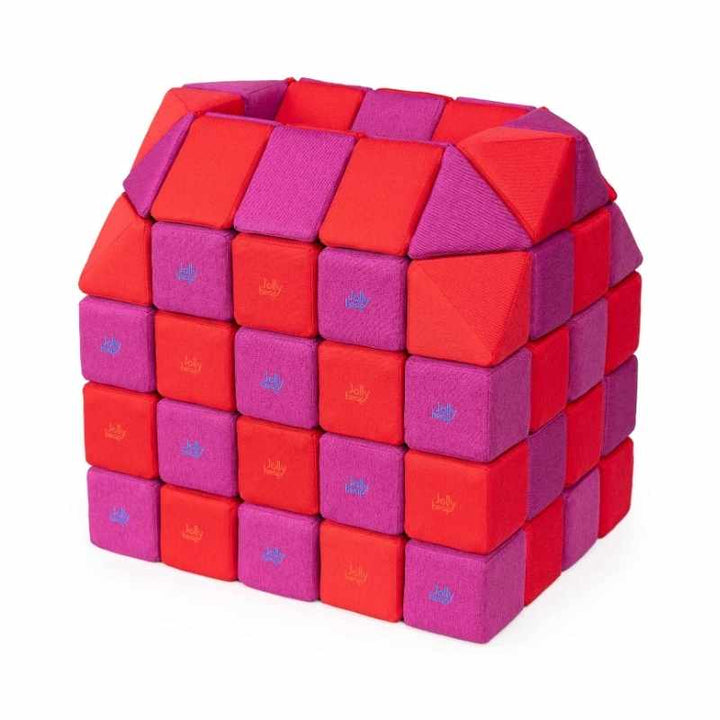 A small structure built with JollyHeap Creative Set soft magnetic blocks in a red and violet colour combination