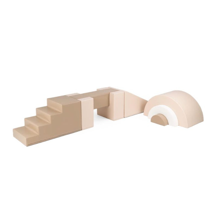 IGLU Balance Gym soft play balance beam set in Soft Serve beige tones with stairs, bridge, ramp and rainbow arch pieces